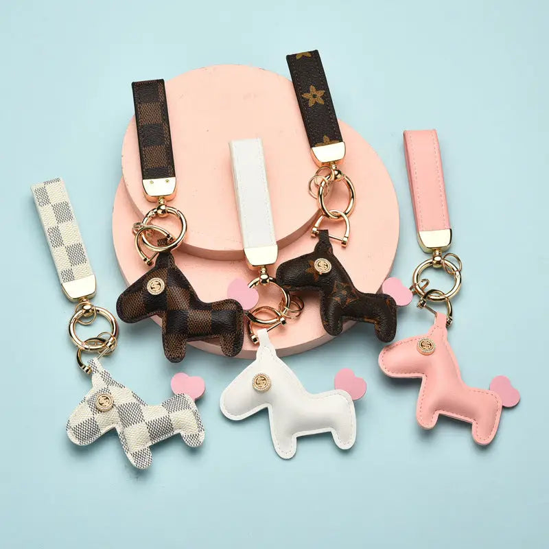 This keychain is not only a pendant, but also can be used as a coin purse in white which is very practical.