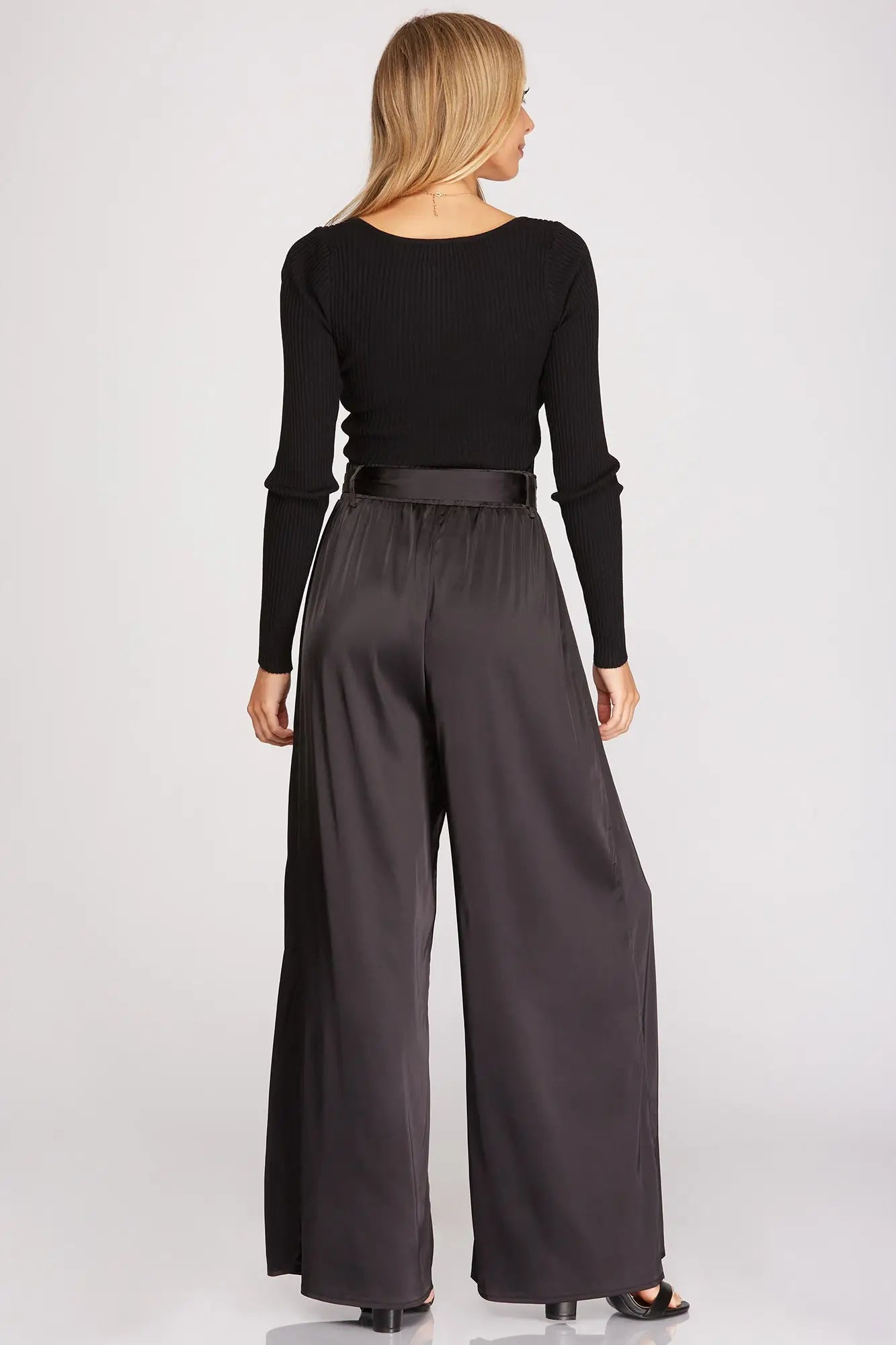 A model wearing Satin Sash Waist Wide Leg Pants in San Luis Obispo.