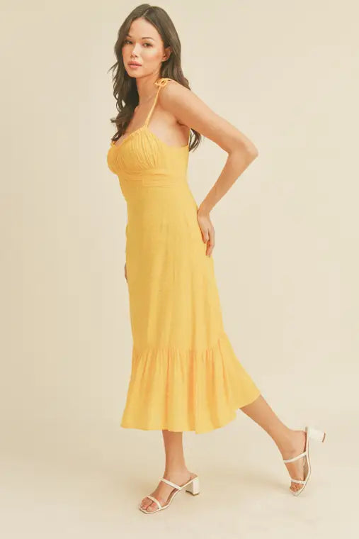 -Swiss Dot Tie Strap Midi Dress -Draped bustline detail -Ruffle detail -Back zipper closure