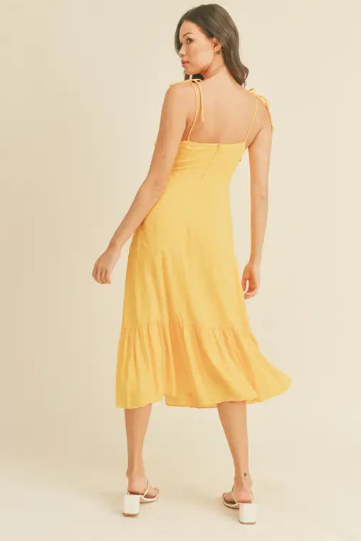 -Swiss Dot Tie Strap Midi Dress -Draped bustline detail -Ruffle detail -Back zipper closure