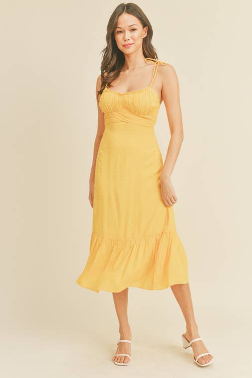 -Swiss Dot Tie Strap Midi Dress -Draped bustline detail -Ruffle detail -Back zipper closure