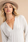 Plus size, solid color, jersey material, deep v-neck with shirring detail, dolman long sleeves knit bodysuit