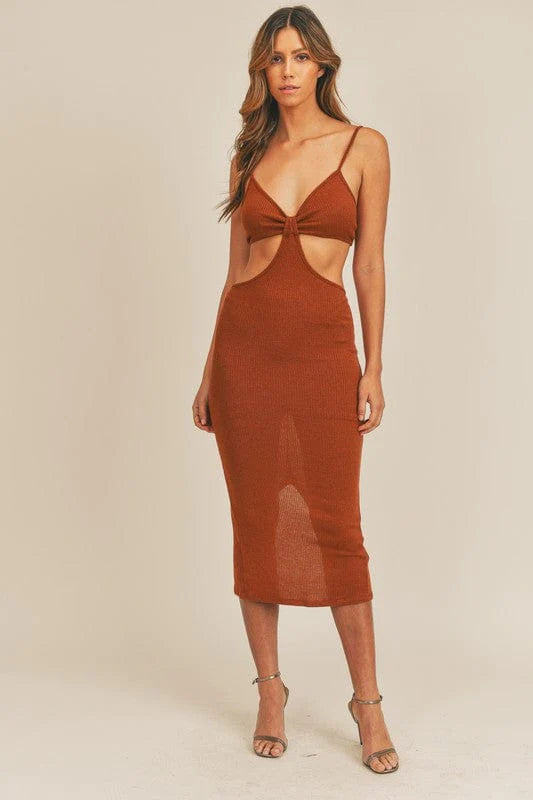  Sip Cognac-colored style with a daring midi cut, featuring a dramatic cut-out detail and a teasing back slit.