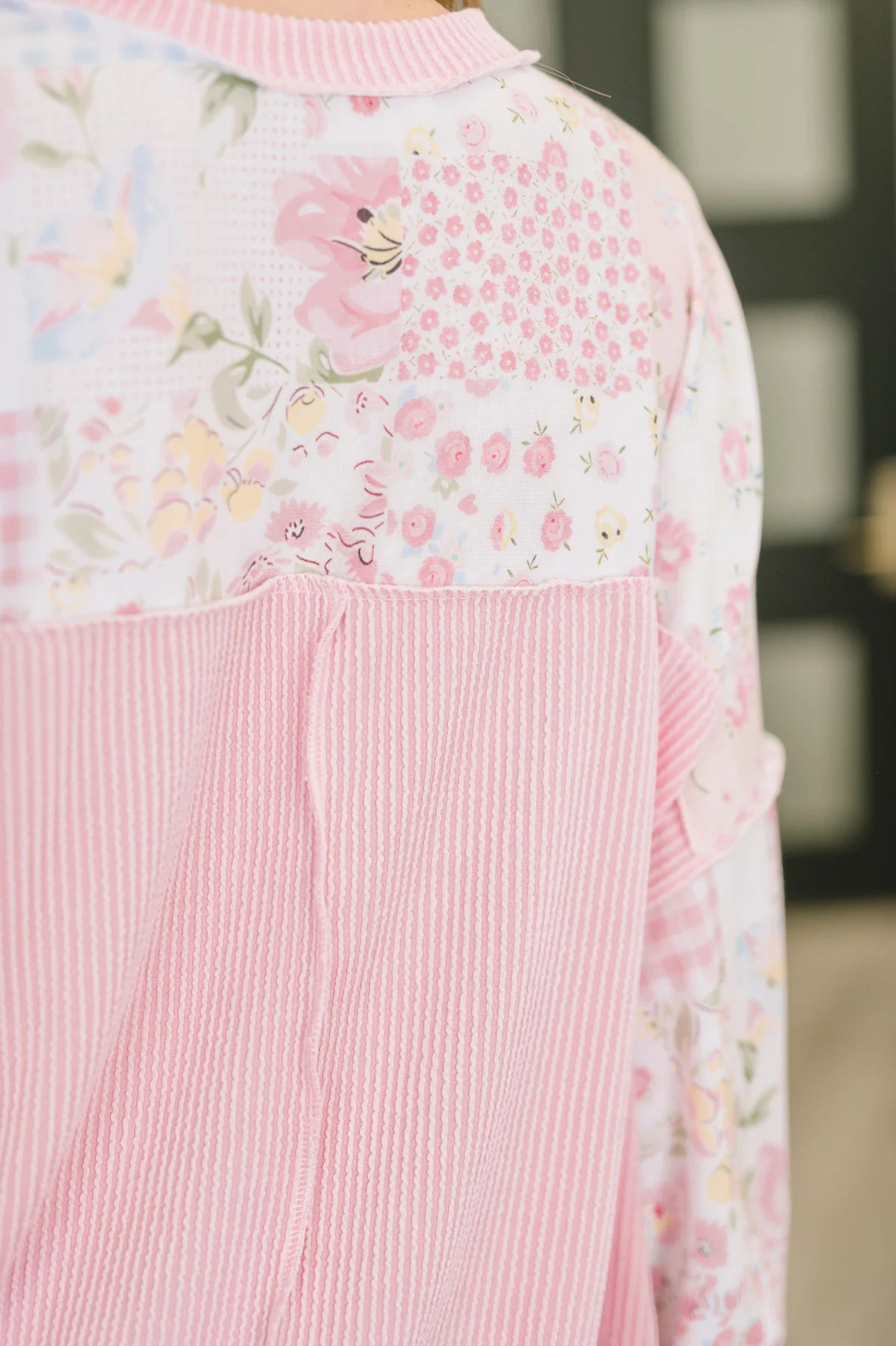 Pink floral dress with a blurred background