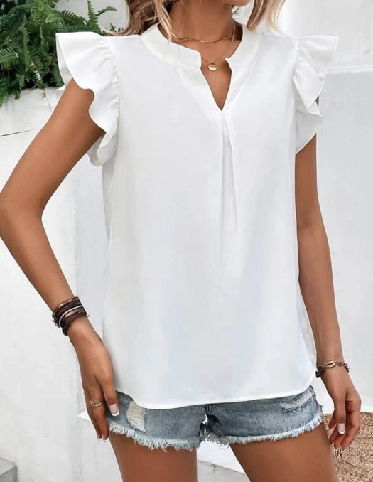 A white shirt with ruffled sleeves and v neck top is perfect for work in SLO.