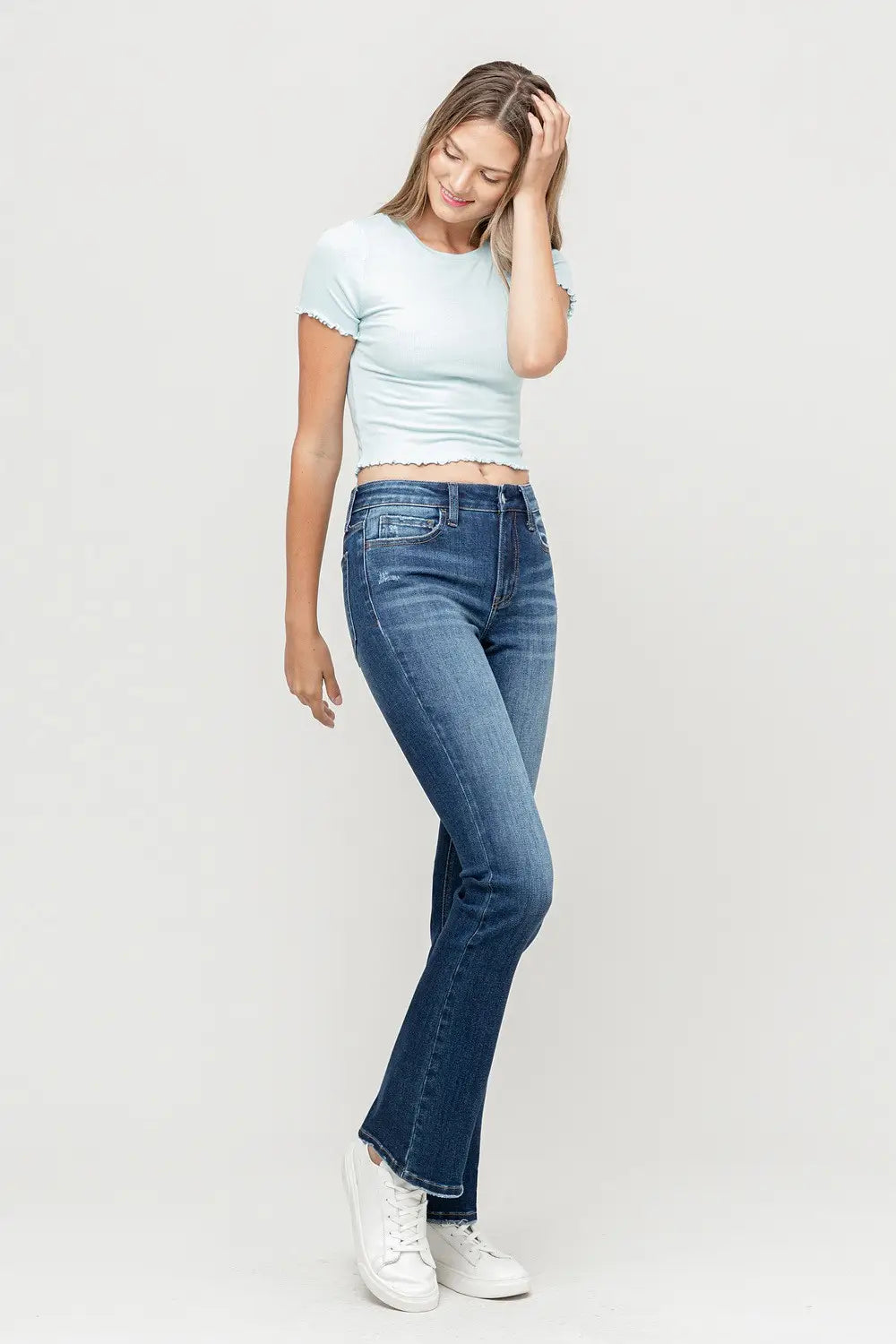 Mid rise flare - comfort stretch denim, flare below the knee, mid-waisted and fitted through the hip, 5 pockets, slightly destruction at the hem