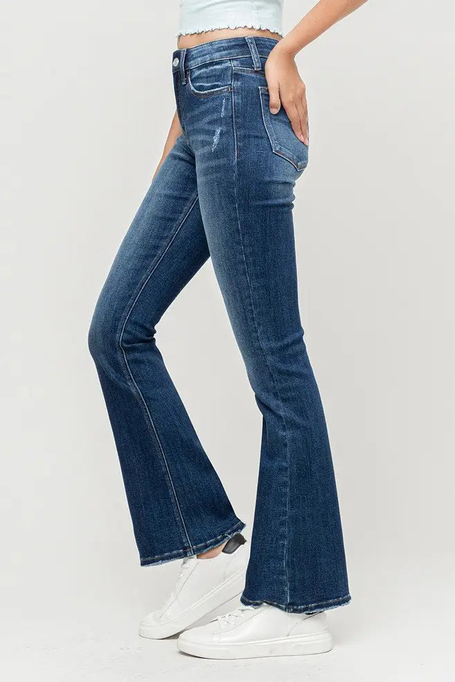 Mid rise flare - comfort stretch denim, flare below the knee, mid-waisted and fitted through the hip, 5 pockets, slightly destruction at the hem