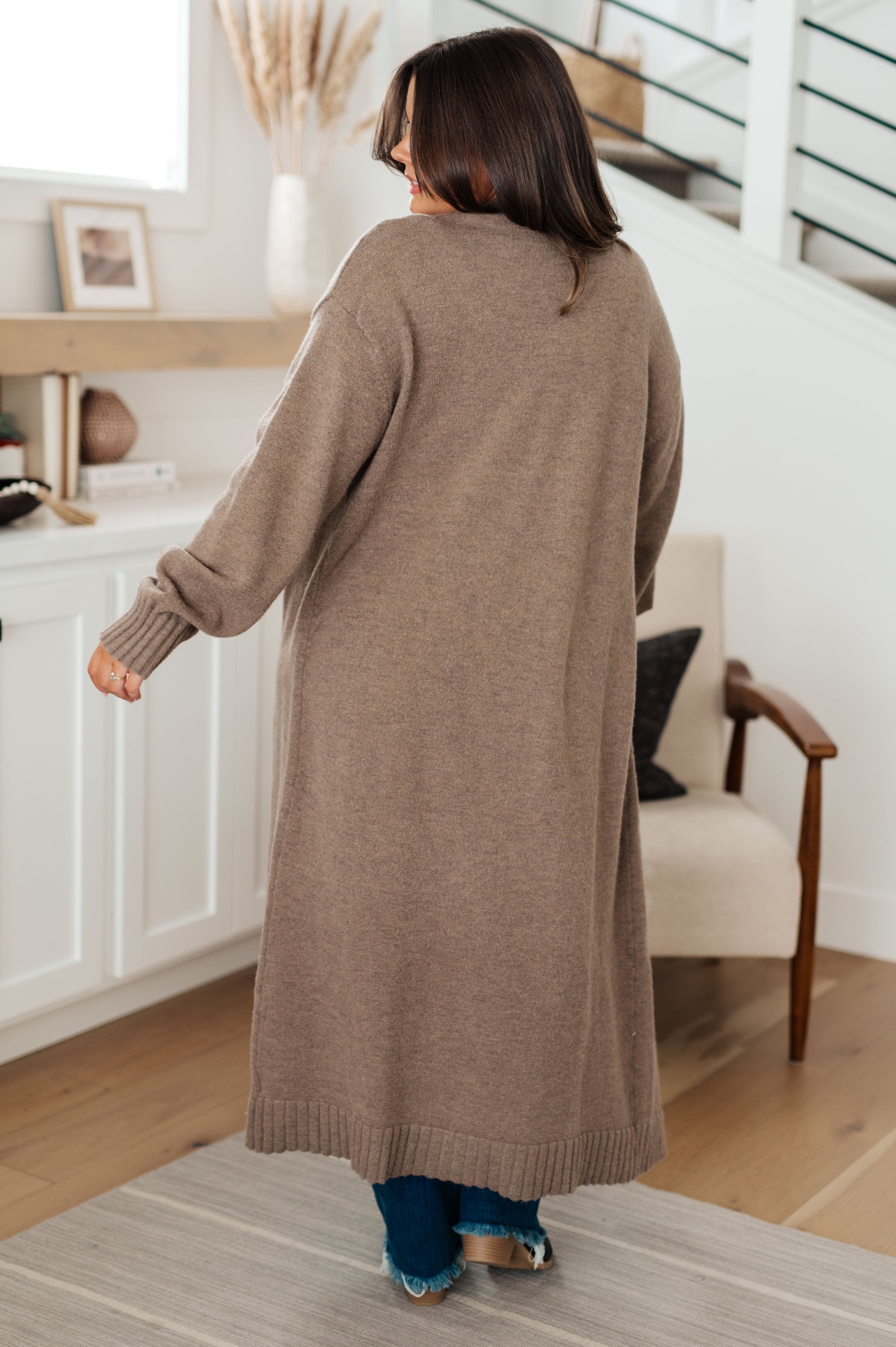 Upgrade your wardrobe this season with this Perfectly Resolved Duster Cardigan. Featuring a warm sweater knit, neutral tone, and duster length, this cardigan pairs perfectly with the perfectly resolved sweater tank for a beautiful timeless look in SLO. plus size